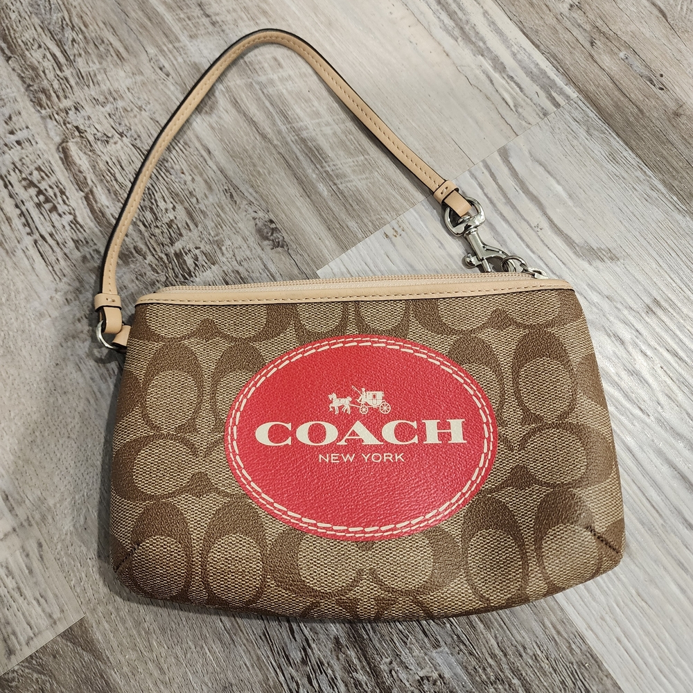 Coach Signature Horse & Carriage Wristlet